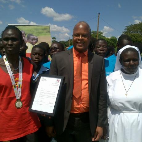 UK Sport's Elias Musangeya (centre) with Sister Winifred (right)